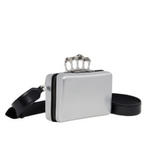 ALEXANDER MCQUEEN MANS THE KNUCKLE TWISTED CLUTCH IN SILVER